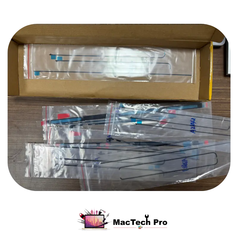 Applying primer and original adhesive tape during a MacBook internal screen replacement — MacTech Pro Dubai