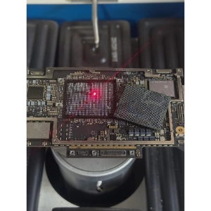 BGA reballing and Apple Silicon M-series power IC replacement on a MacBook logic board in Dubai — MacTech Pro