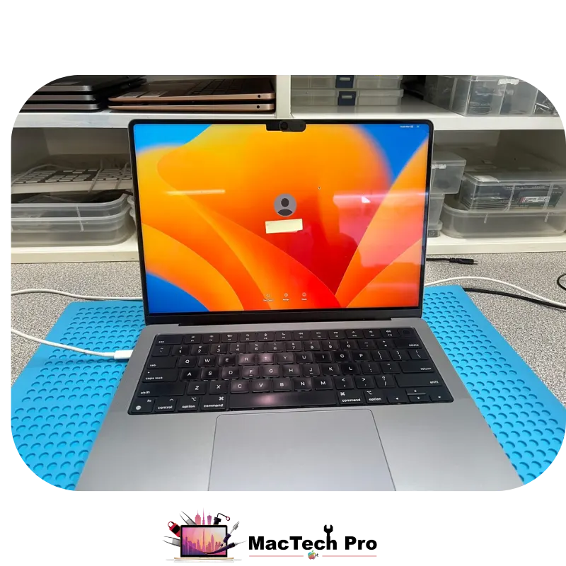14-inch MacBook Pro (A2442) booted into macOS with a full Time Machine backup completing — data saved, MacTech Pro Dubai